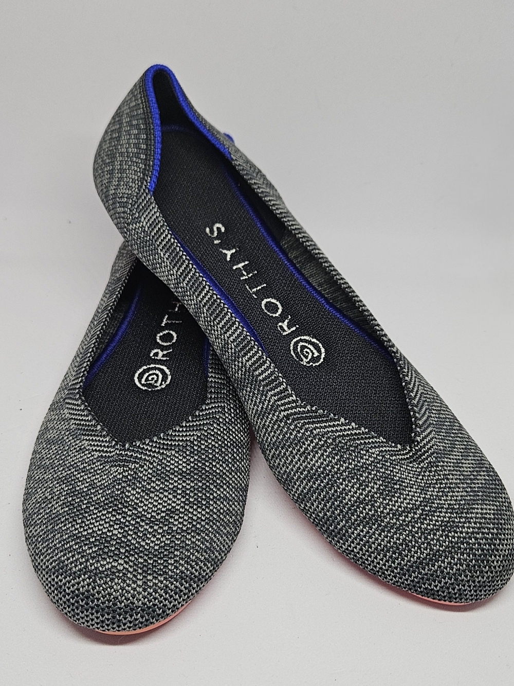 Rothy's Women's Heather Gray Knit Ballet Flat With Light Pink Sole.
